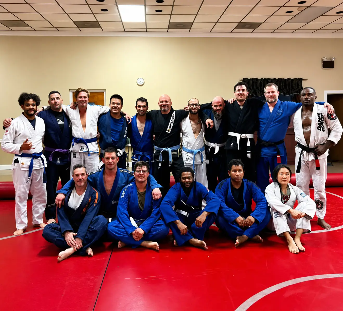 Daniel Gracie Team students and coaches training together on the mat